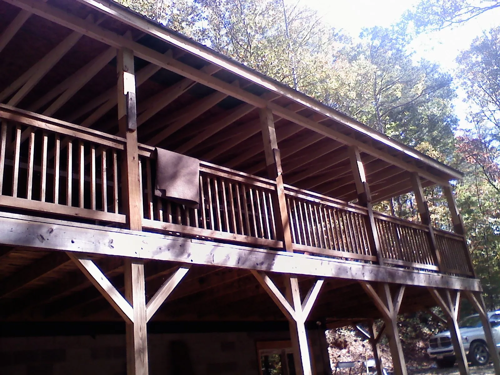 Timber framing under a new elevated porch and deck — Roof Leak Repair in Marengo by Roofing Brothers